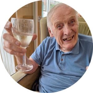 Springdene Care Homes resident enjoying a celebratory moment during a social activity