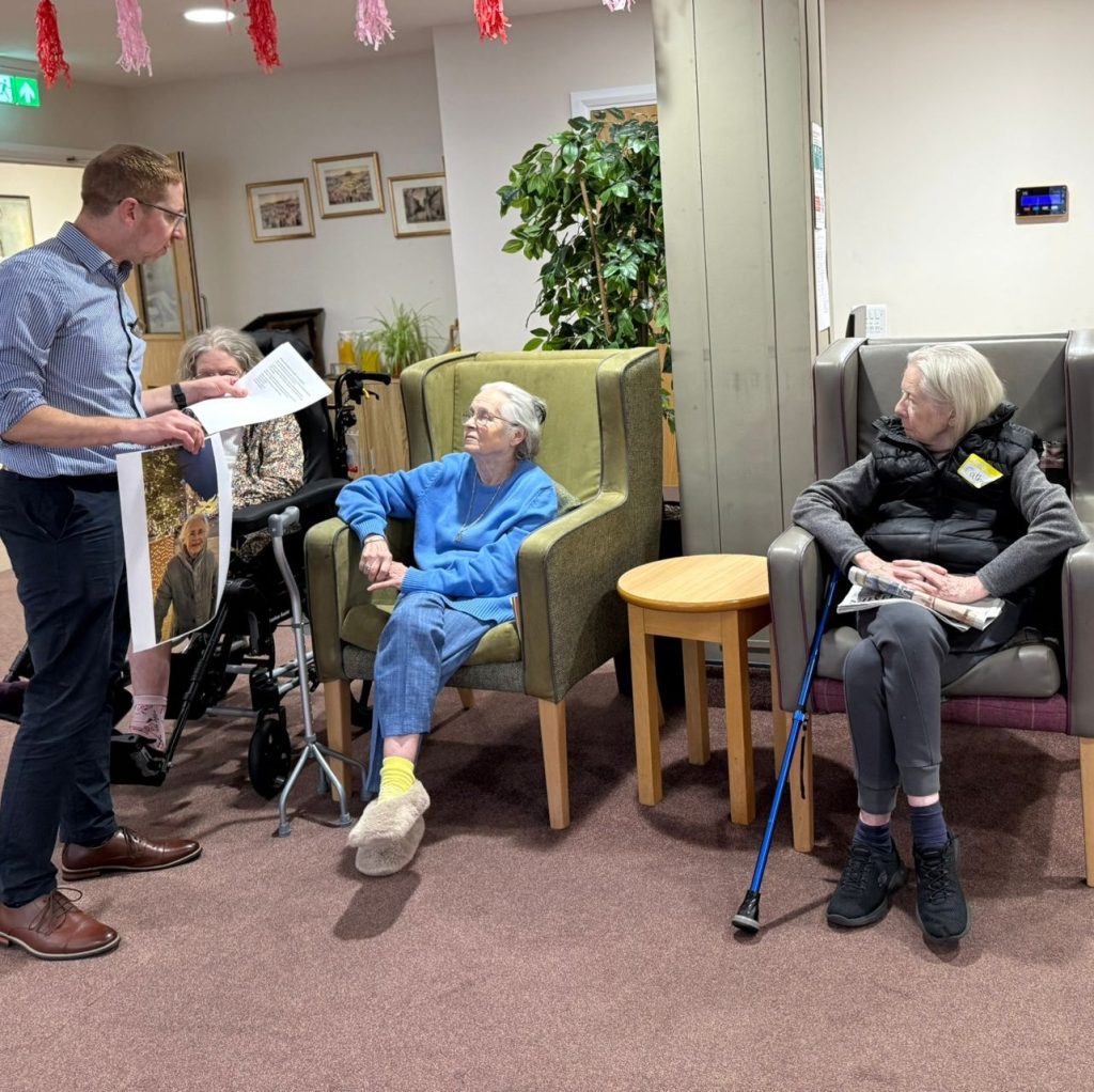 Residents gathered together for a group activity celebrating women in science at Spring Lane Care Home
