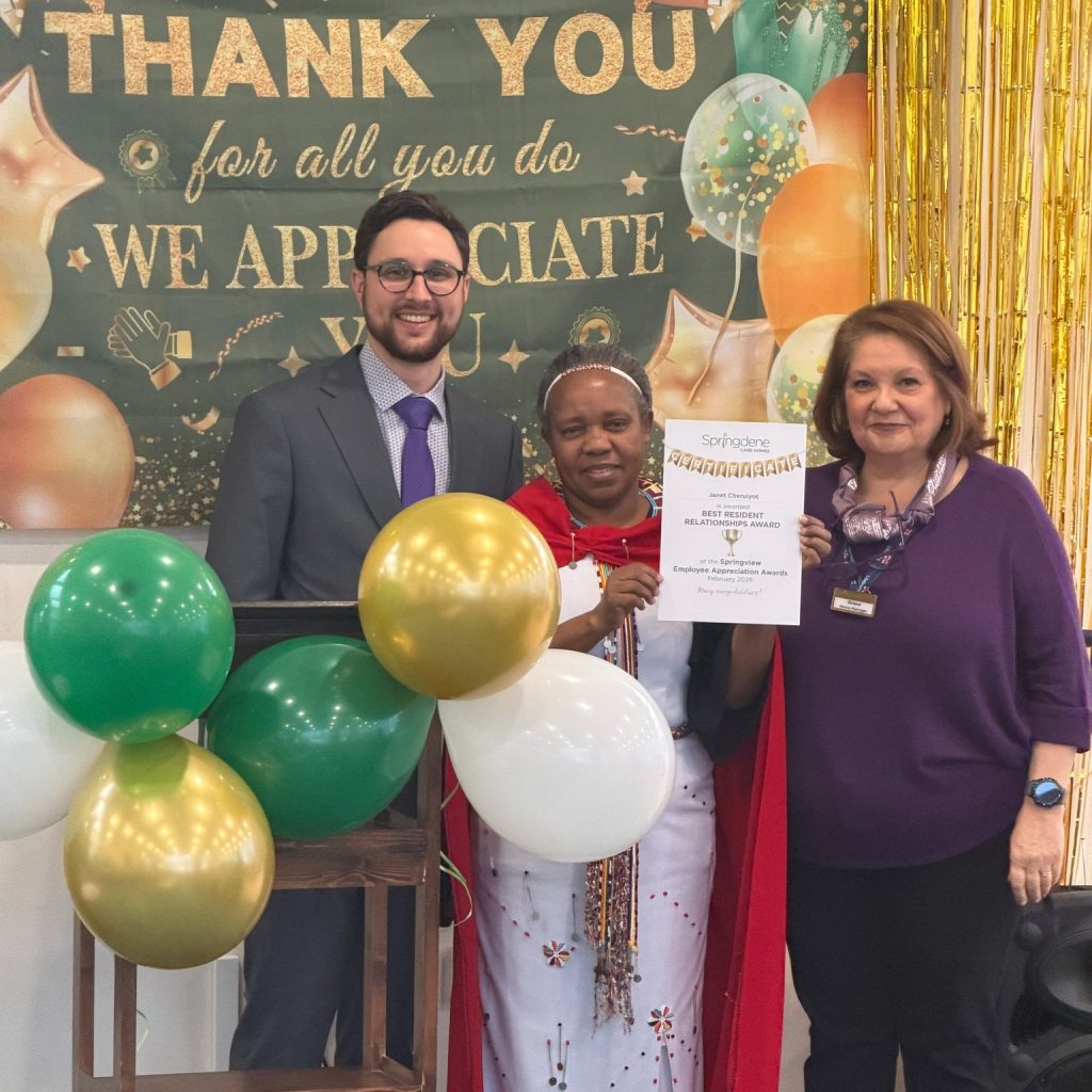 Team member receiving mentoring award at Springview Care Home Employee Appreciation Day
