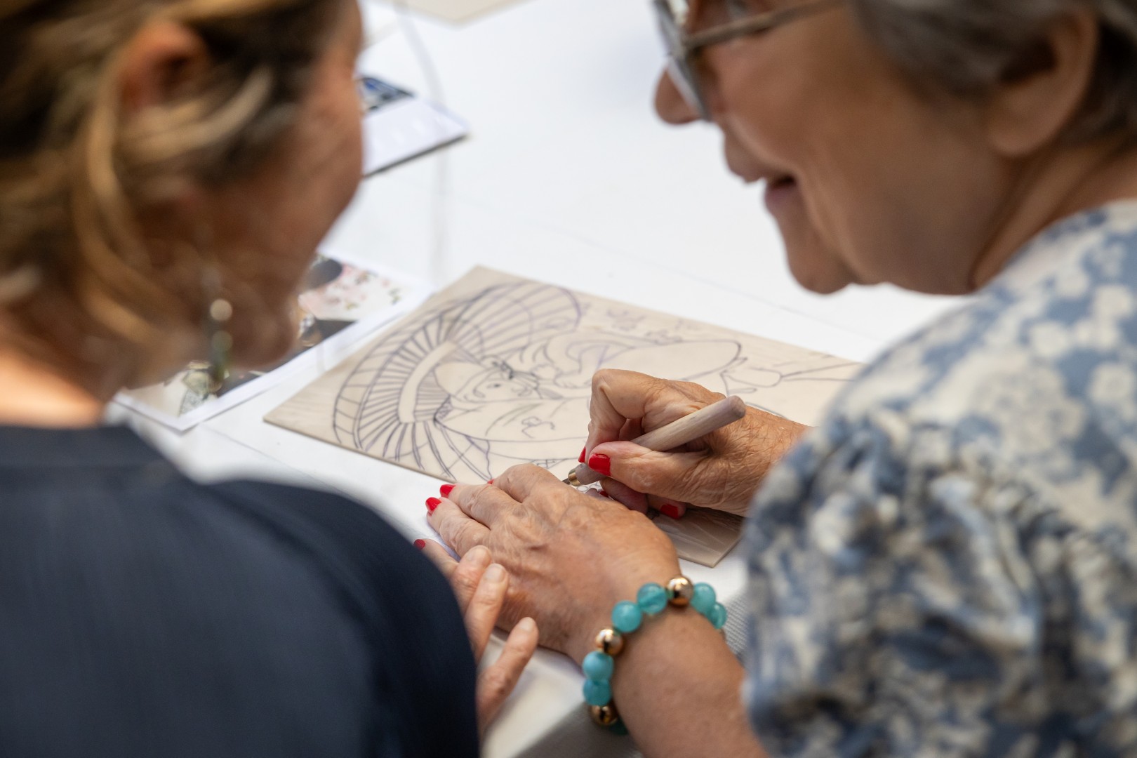 Residents enjoying a creative art activity at Springdene Care Homes
