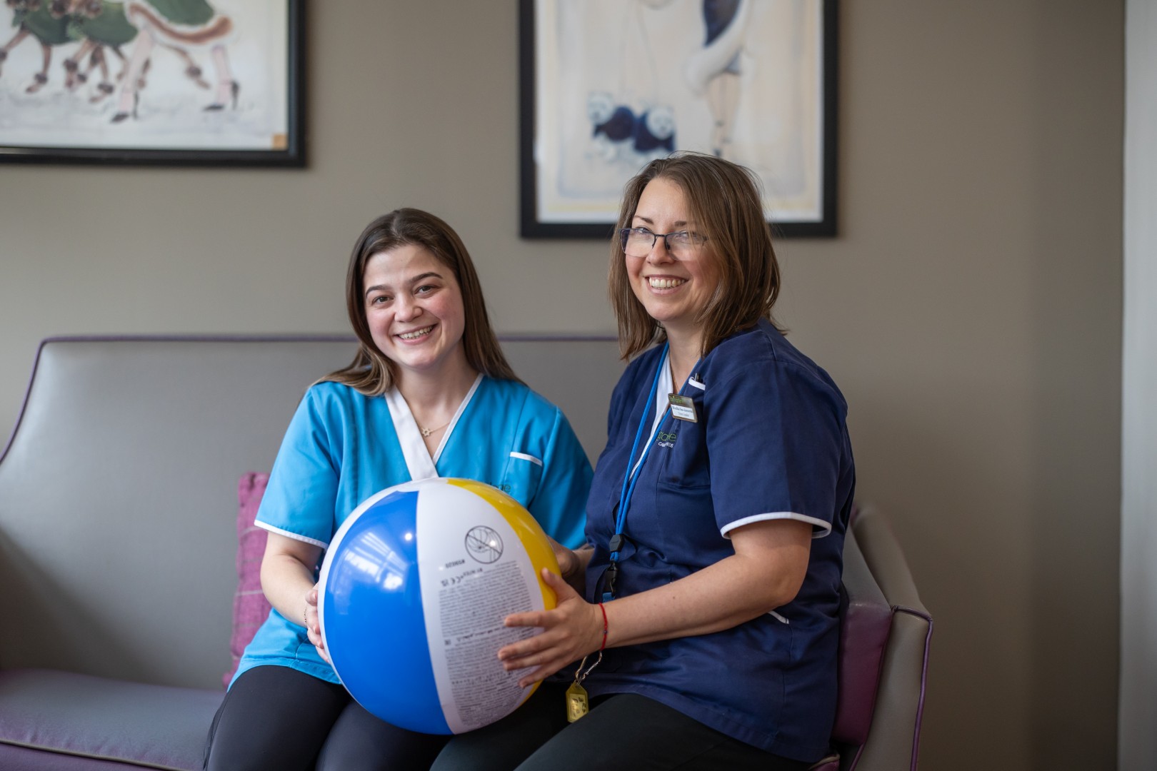 Two Springdene Care Homes team members smiling together
