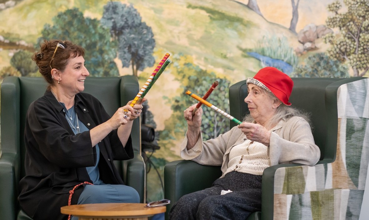 Springdene team member enjoying an activity with a resident at a North London care home