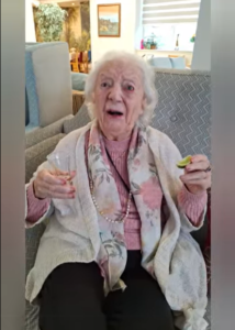 Springdene resident enjoying a National Tequila Day activity with a glass and lime.